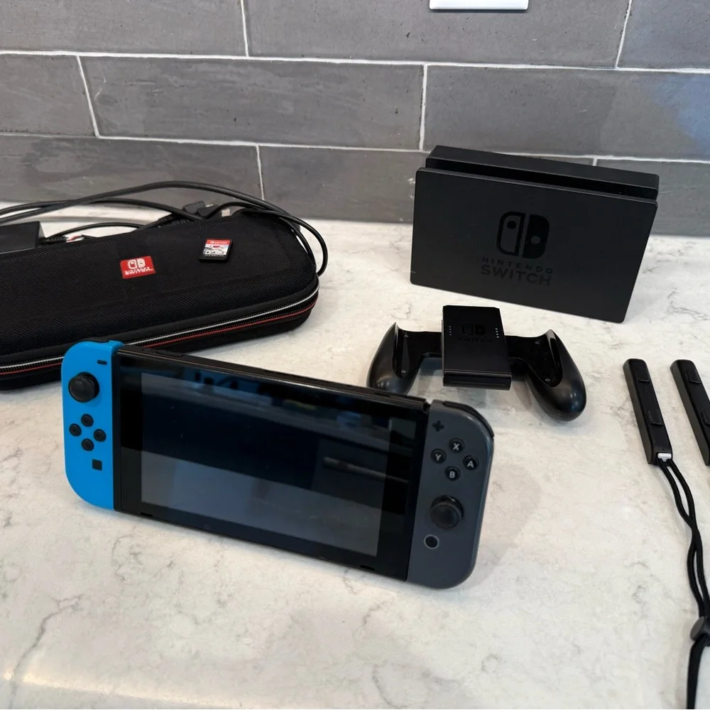 Nintendo Switch Console w/ Game, Case, Dock, and Joy-Cons.